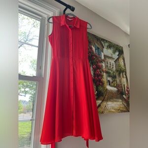 Beautiful Nanette Lepore button front dress with belt and slip.